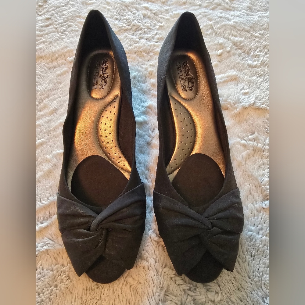 Coach and Four Black Heels with Sleek Design